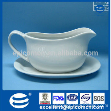 pure white ceramic gravy boat with tray